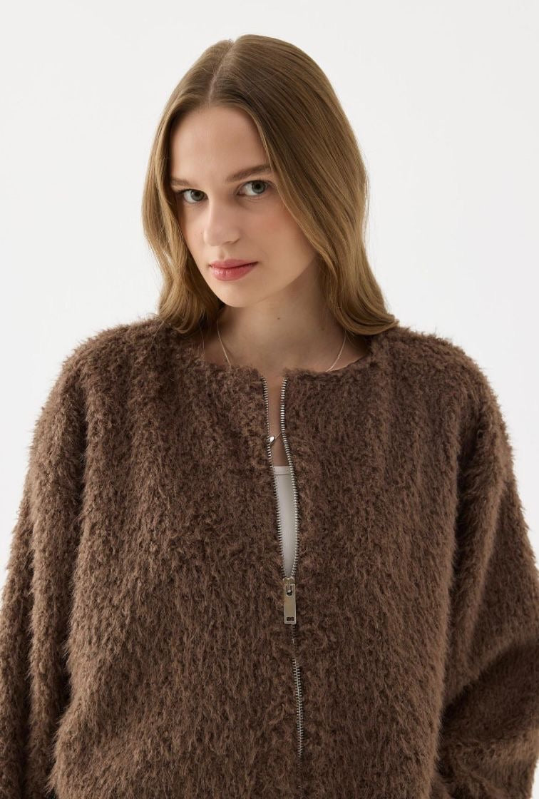 Dua Pluche Vest koffiebruin one-size detail close-up pluche stof teddy look