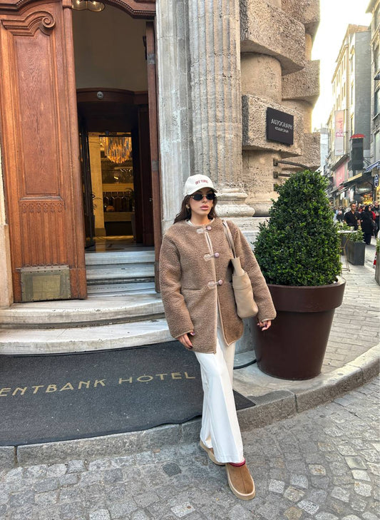 Zachte teddy coat voor dames – duffelmodel met houtje-touwtje sluiting