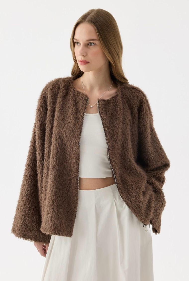 Dua Pluche Vest koffiebruin one-size zijaanzicht comfortabele losvallende pasvorm